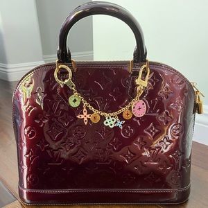 Louis Vuitton Alma Vernis Handbag Amarante